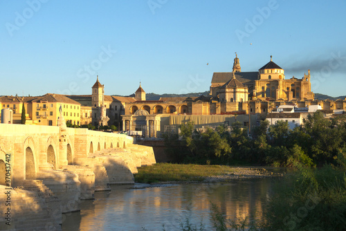 Mezquita-Catedral and Puente Romano - Mosque-Cathedral and the Roman Bridge in Cordoba, Andalusia, Spain.