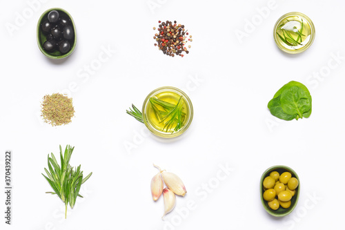 Fototapeta Naklejka Na Ścianę i Meble -  Rosemary oil and spices on white background