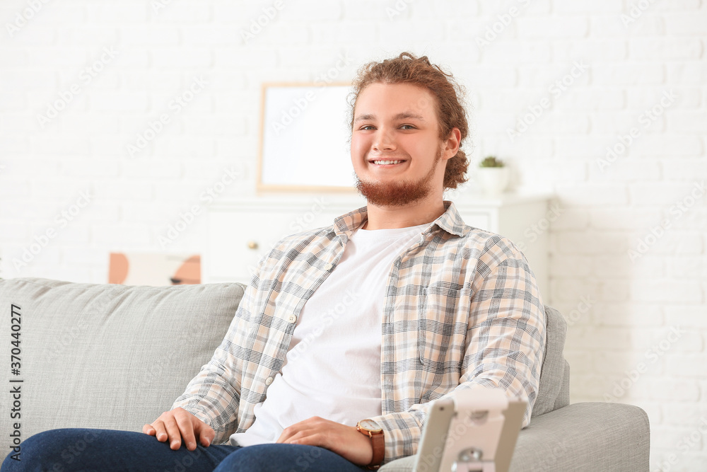 Obraz premium Young man resting at home