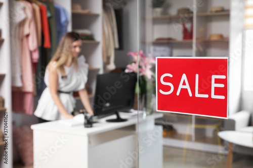 Sticker with word SALE on t...