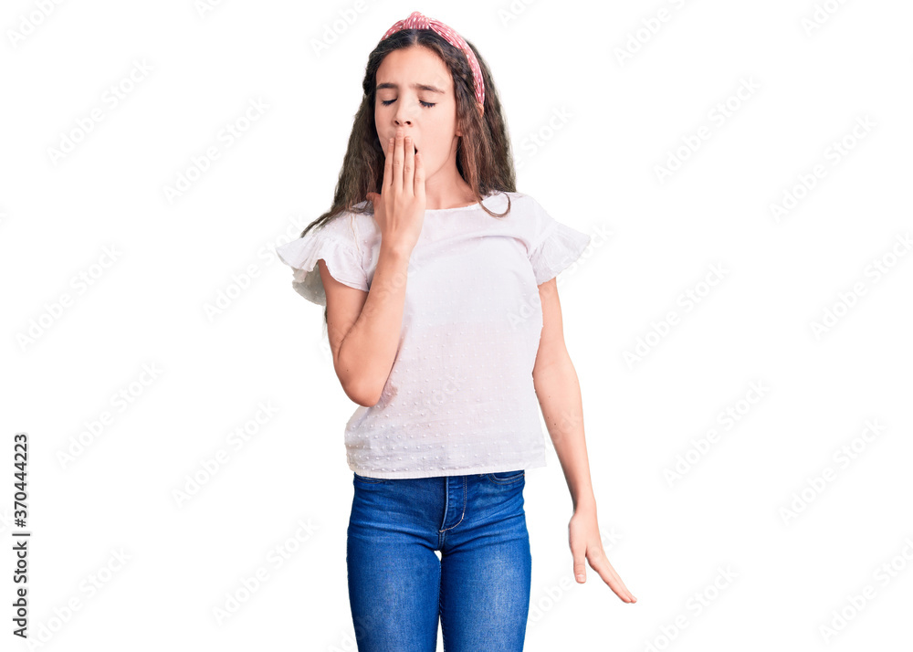 Cute hispanic child girl wearing casual white tshirt bored yawning tired covering mouth with hand. restless and sleepiness. Cute hispanic child girl wearing casual white tshirt bored yawning tired covering mouth with hand. restless and sleepiness.
