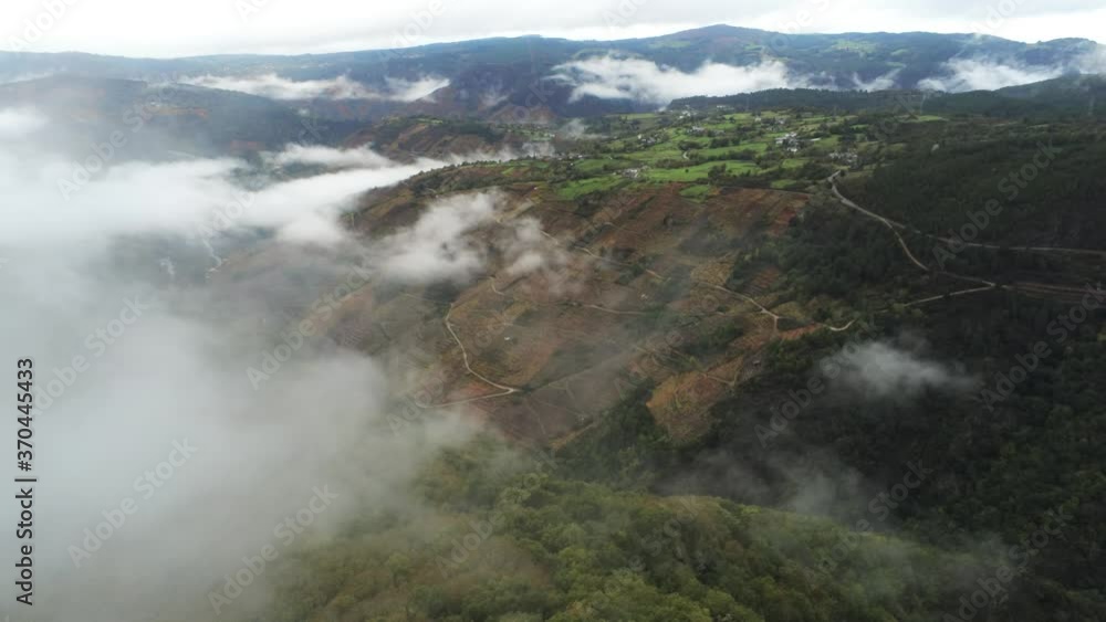 Beautiful aerial panoramic view of Mountains covered by clouds and fog. Galicia,Spain Beautiful aerial panoramic view of Mountains covered by clouds and fog. Galicia,Spain