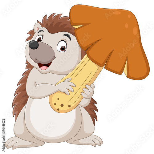 Cartoon little hedgehog holding a big mushroom