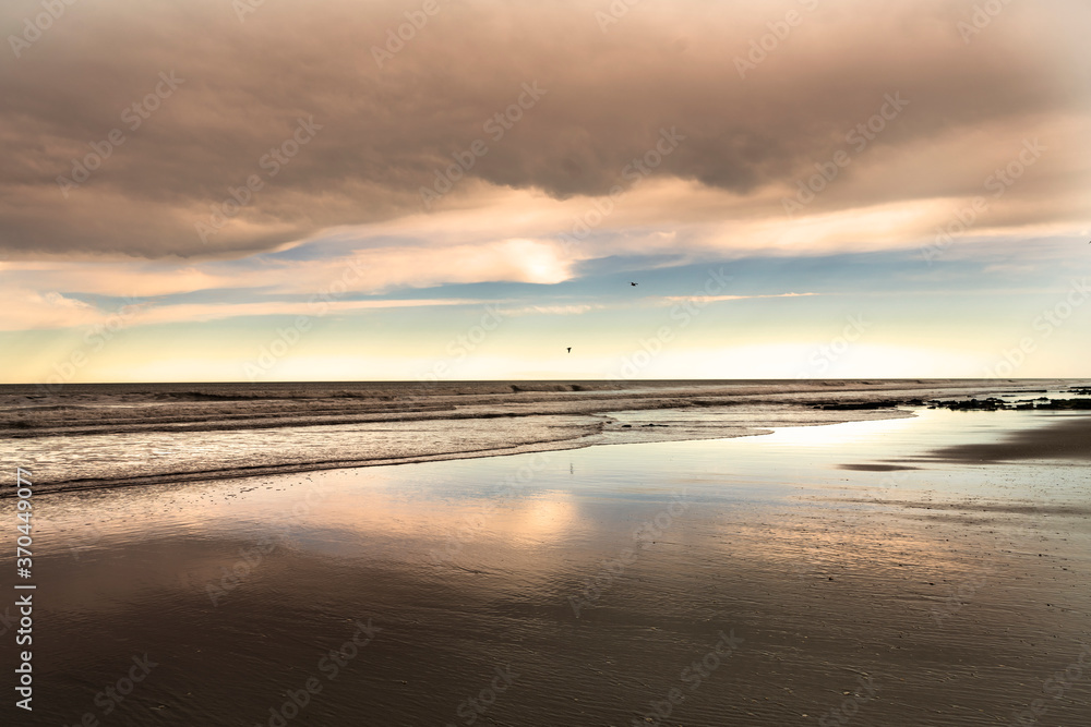 Naklejka premium sunset on the beach