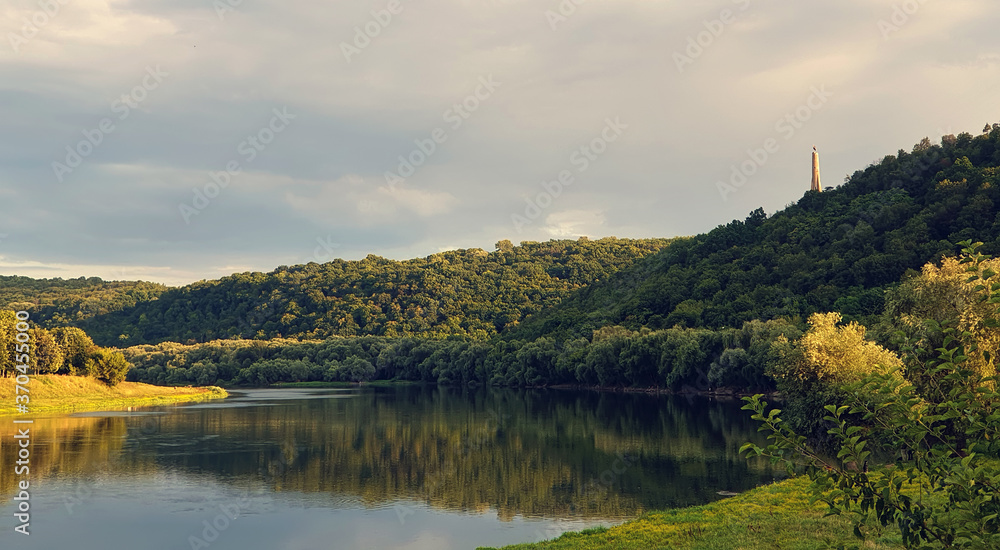 Fototapeta premium Panoramic view on river Dniester and monument Lumanarea Recunostintei in the Soroca town on summer, Moldova, the north-eastern part of the country. Picturesque landscape.