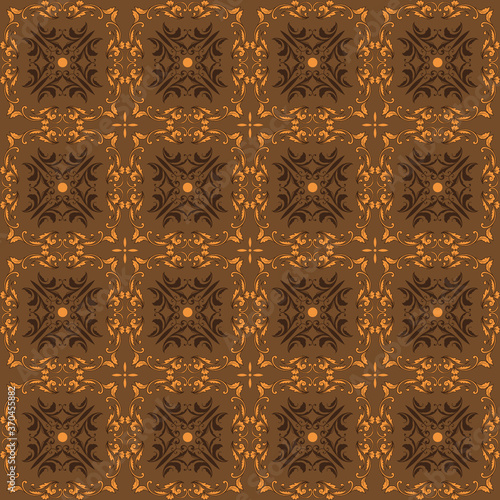 Beautiful flower pattern design on Indonesia batik with brown golden color.