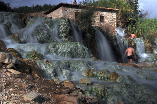 water falls at Saturnia hot springs at Toskany, Italy. Long exposure photo