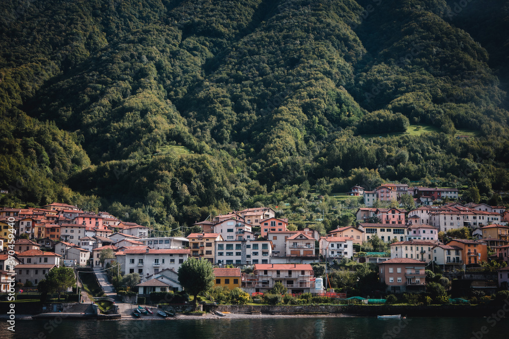Italian villages built on the steep shores of lake como, Italy.  