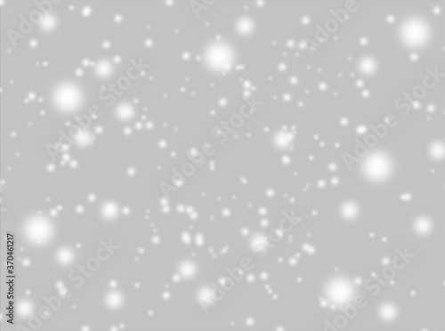 A brilliant gray background with circles. Template for a holiday card with bright and sparkling lights.