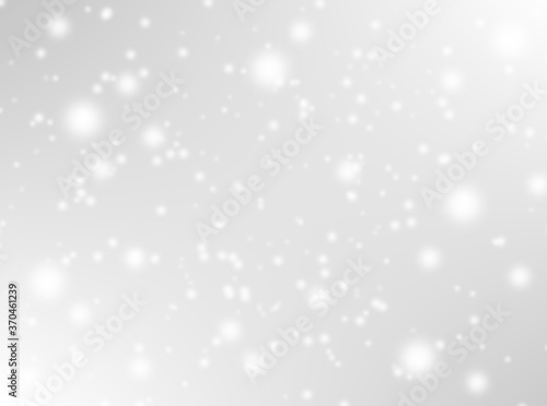 A brilliant gray background with circles. Template for a holiday card with bright and sparkling lights.