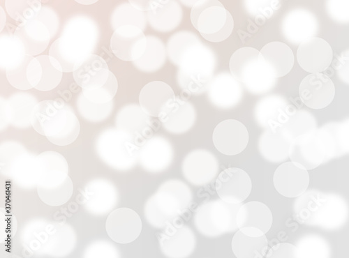 silver bokeh beautiful blurred glitter light on abstract background. grey wallpaper. 