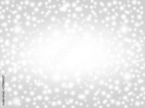 A brilliant gray background with circles. Template for a holiday card with bright and sparkling lights.