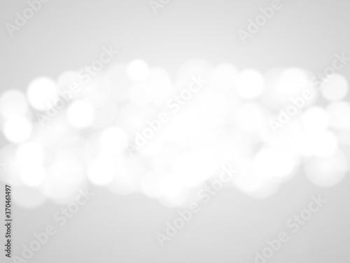 silver bokeh beautiful blurred glitter light on abstract background. grey wallpaper. 