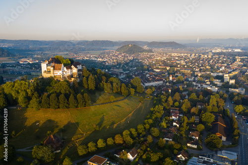 Aerial view of Lenzburg Castle with alpine panorama