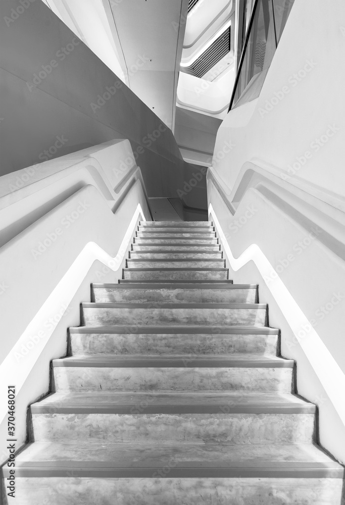 Interior view of futuristic stairway in modern architecture Interior view of futuristic stairway in modern architecture