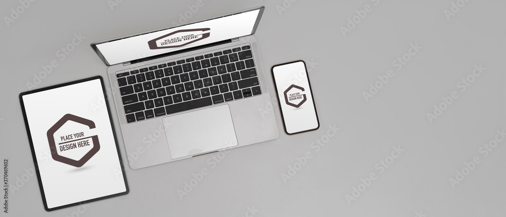 Mock up digital device on white background with digital tablet, smartphone and laptop Mock up digital device on white background with digital tablet, smartphone and laptop