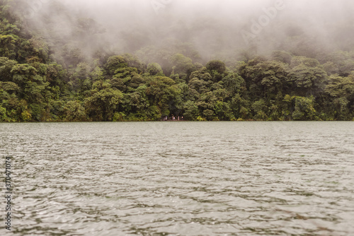 Obraz na płótnie lake in the Cerro Chato volcano cone surrounded by vegetation and fog w salonie