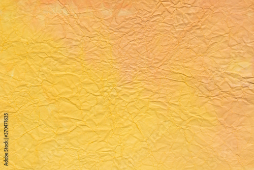 creased painted orange paper background texture
