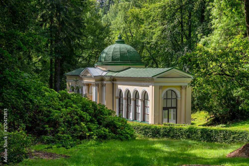 Fototapeta premium Pavilion of Forest mineral water spring - summer time in Czech spa city Marianske Lazne (Marienbad) - Czech Republic