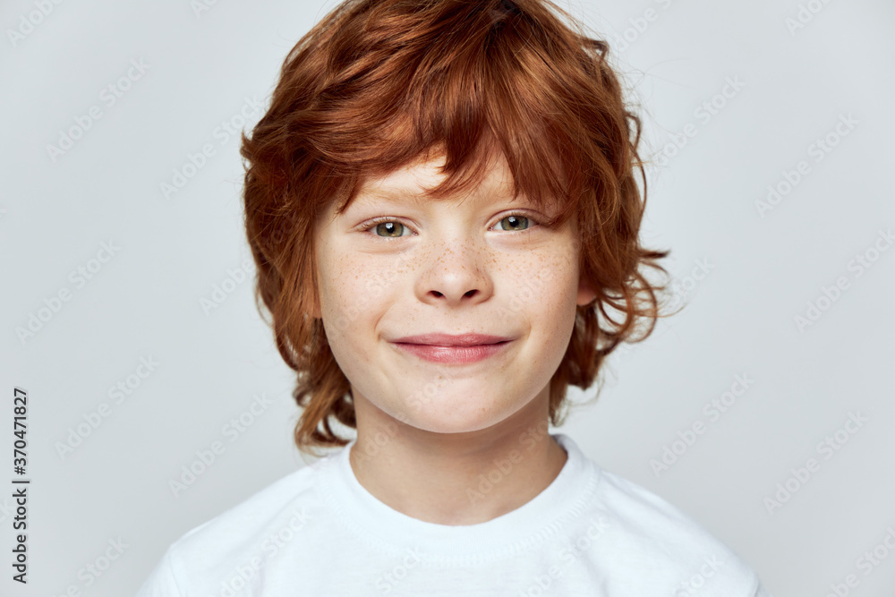 portrait of a redhead boy smile cropped view face closeup freckles portrait of a redhead boy smile cropped view face closeup freckles