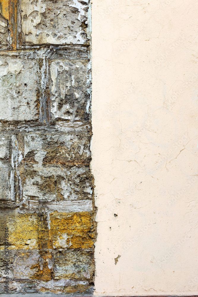 Stone wall background. Background of stone wall of boulders and pebbles Stone wall background. Background of stone wall of boulders and pebbles