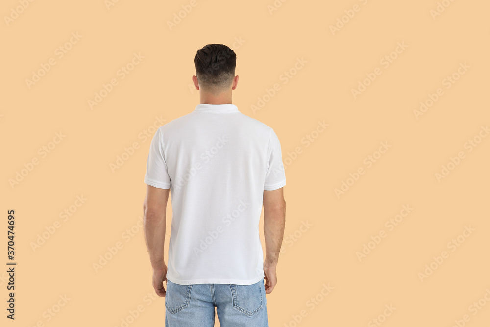 Young man in stylish t-shirt on color background Young man in stylish t-shirt on color background