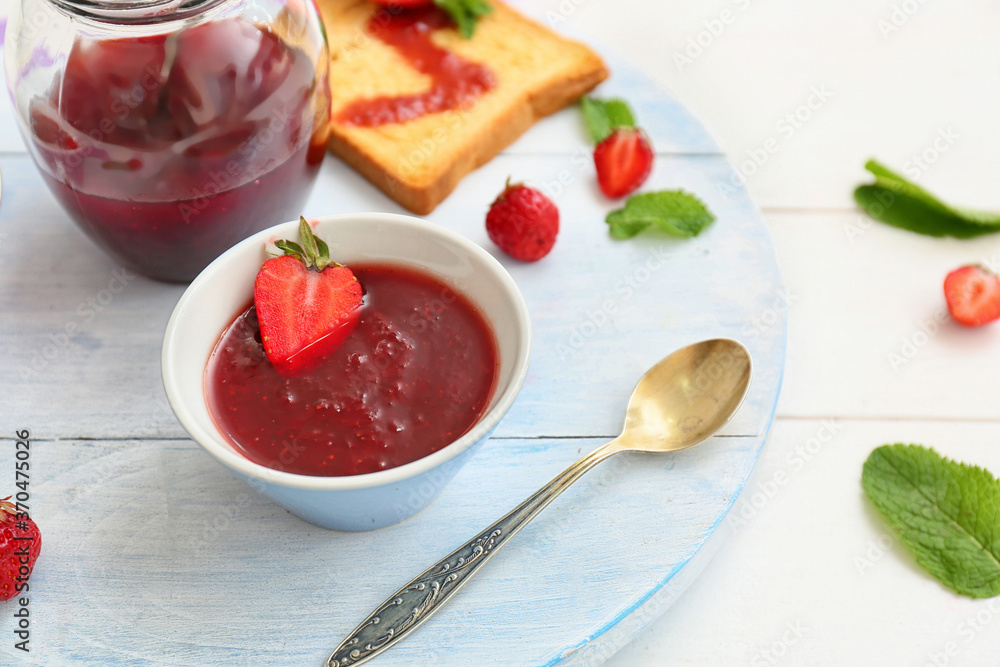 Sweet strawberry jam and toasted bread on table Sweet strawberry jam and toasted bread on table