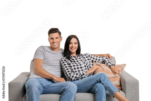 Young couple relaxing on so...