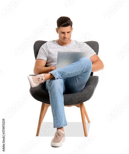 Young man with laptop relax...