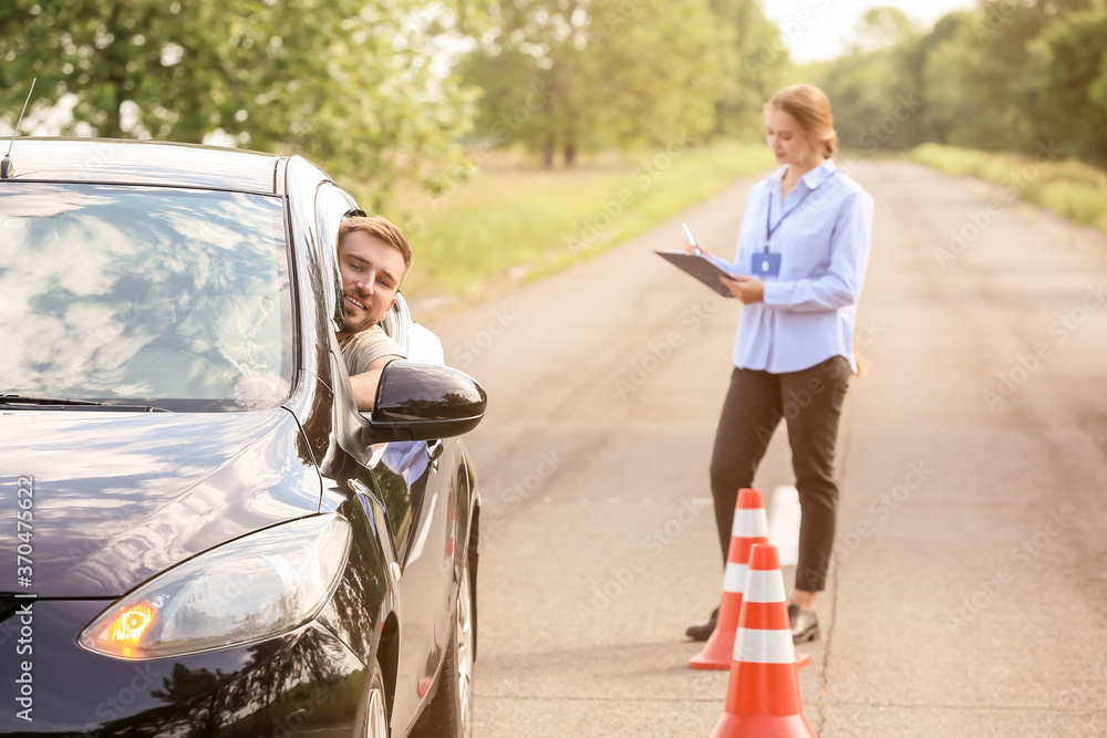 Instructor conducting driver licence test Instructor conducting driver licence test