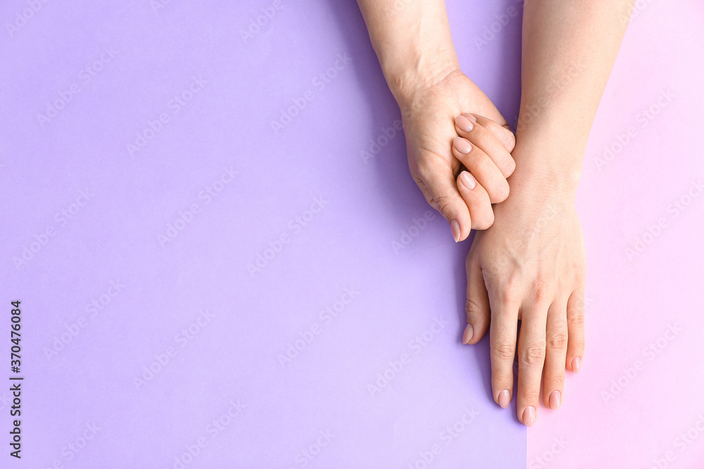 Hands with beautiful manicure on color background - obrazy, fototapety, plakaty 