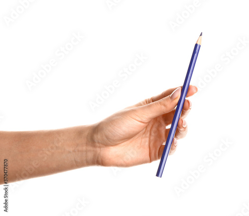 Hand with color pencil on white background