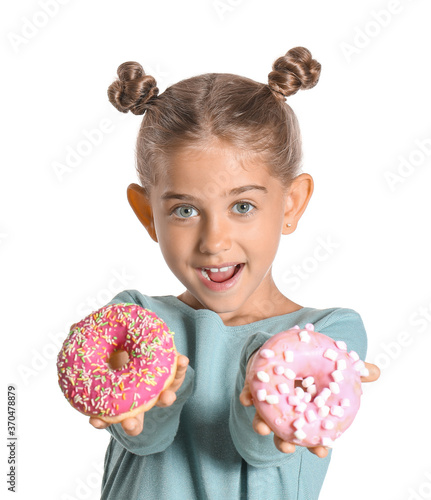 Funny little girl with donu...