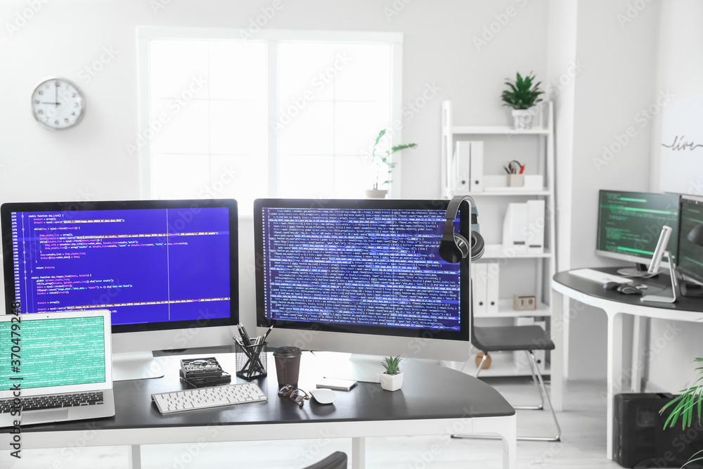 Modern workplace of programmer in office Modern workplace of programmer in office