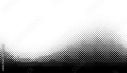 Abstract halftone monochrome dotted pattern.