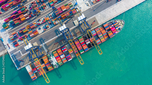 Container ship business freight import export logistic and transportation by container ship, Aerial view, Aerial top view container cargo ship in import export business commercial trade logistic.