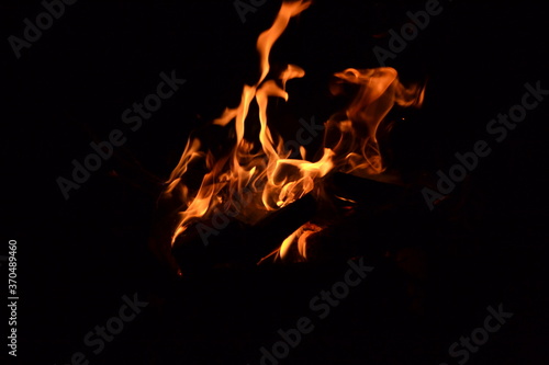 Beautiful dark photo with a burning bonfire
