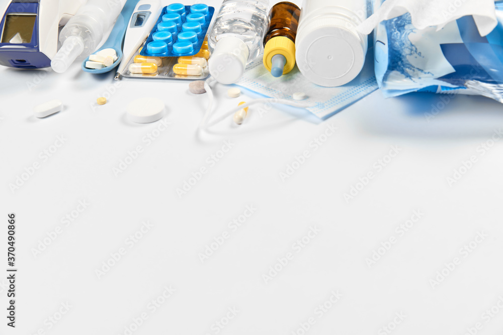 Fototapeta premium Coronavirus concept. Protective medical mask and pill capsules for treatment of COVID-19 coronavirus. Novel corona virus outbreak. Epidemic from Wuhan, China.