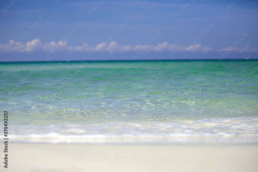 Sea beach with blue sky sand sun. Travel summer holiday background concept. Sea beach with blue sky sand sun. Travel summer holiday background concept.