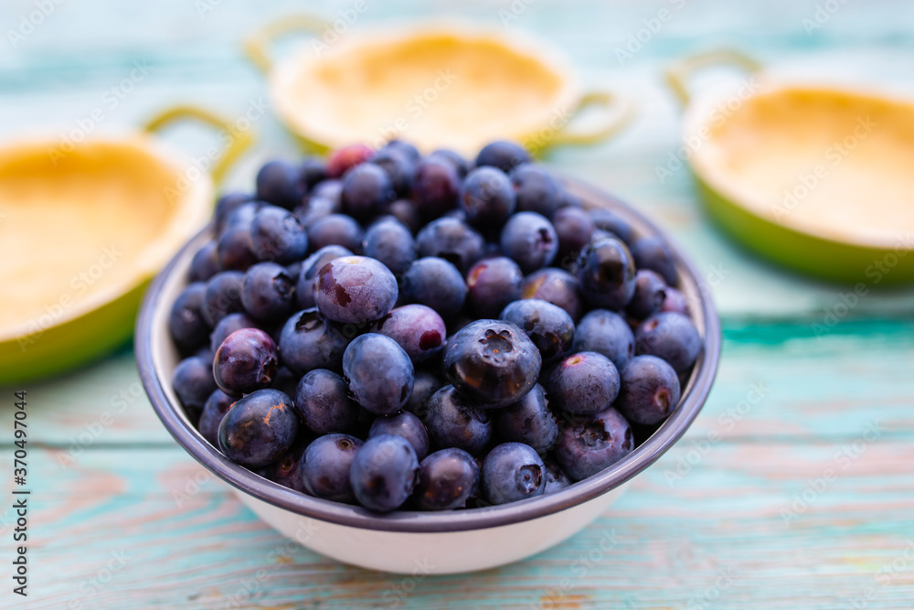 Ingredients for a tart with freshly picked blueberries. Ingredients for a tart with freshly picked blueberries.