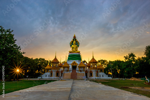 background of one of the beautiful religious attractions in the Ubon Ratchathani Province of Thailand (Wat Mongkol Kowitharam) has beautiful sculptures and is worth preserving for future generations t