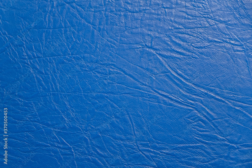 Texture of blue leather surface, fabric for sewing furniture and other products. Texture of blue leather surface, fabric for sewing furniture and other products.