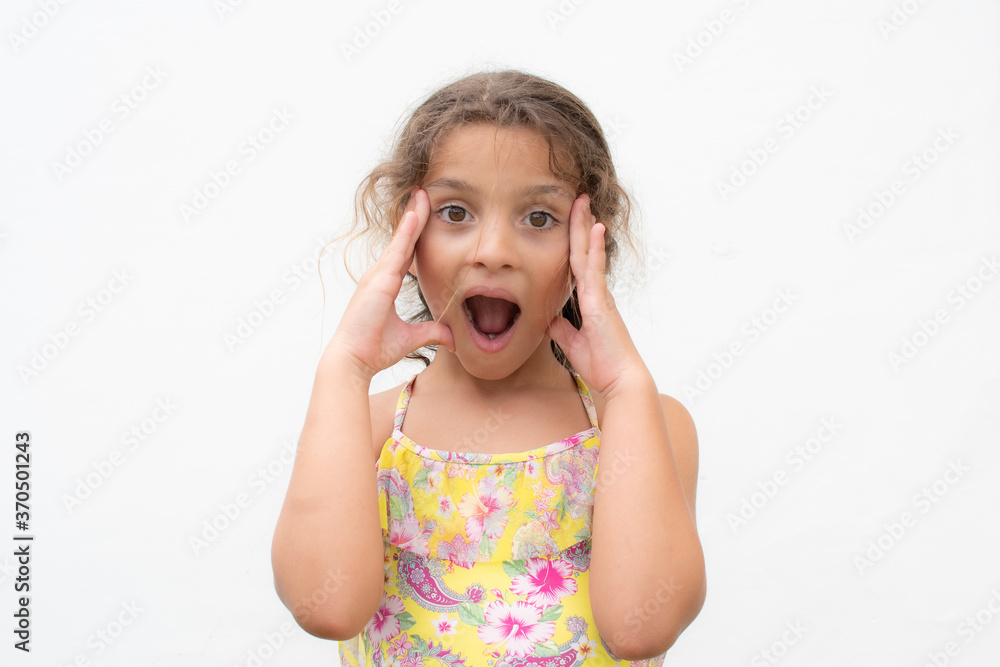 Beautiful little girl with swimsuit with surprised gesture Stock Photo ...