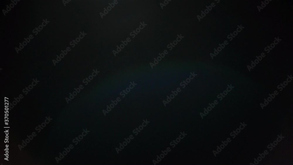 Real Light Leaks and Unseen Lens Flare Shot at 50p, Light reflection of a glass crystal making colorful abstract prism figures. Real Light Leaks and Unseen Lens Flare Shot at 50p, Light reflection of a glass crystal making colorful abstract prism figures.