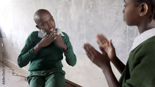 Hearing impaired children, learning sign language at school for the deaf. Kenya, Africa.