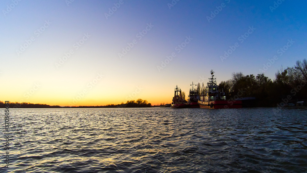 Ships near the pier in the evening on the Danube River