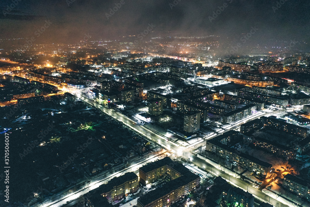 The night city. Fog over the night city. The night city. Fog over the night city.