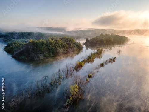 Morning fog over lake.