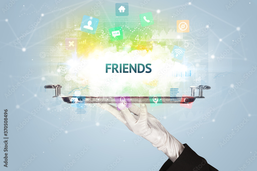 Waiter serving social networking concept with FRIENDS inscription Waiter serving social networking concept with FRIENDS inscription