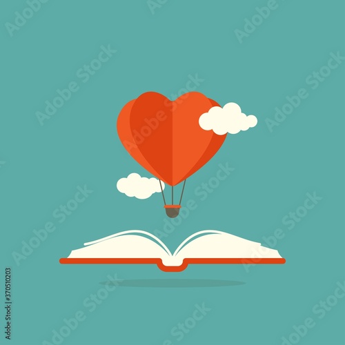 Open book with heart air balloon and clouds isolated on blue background.